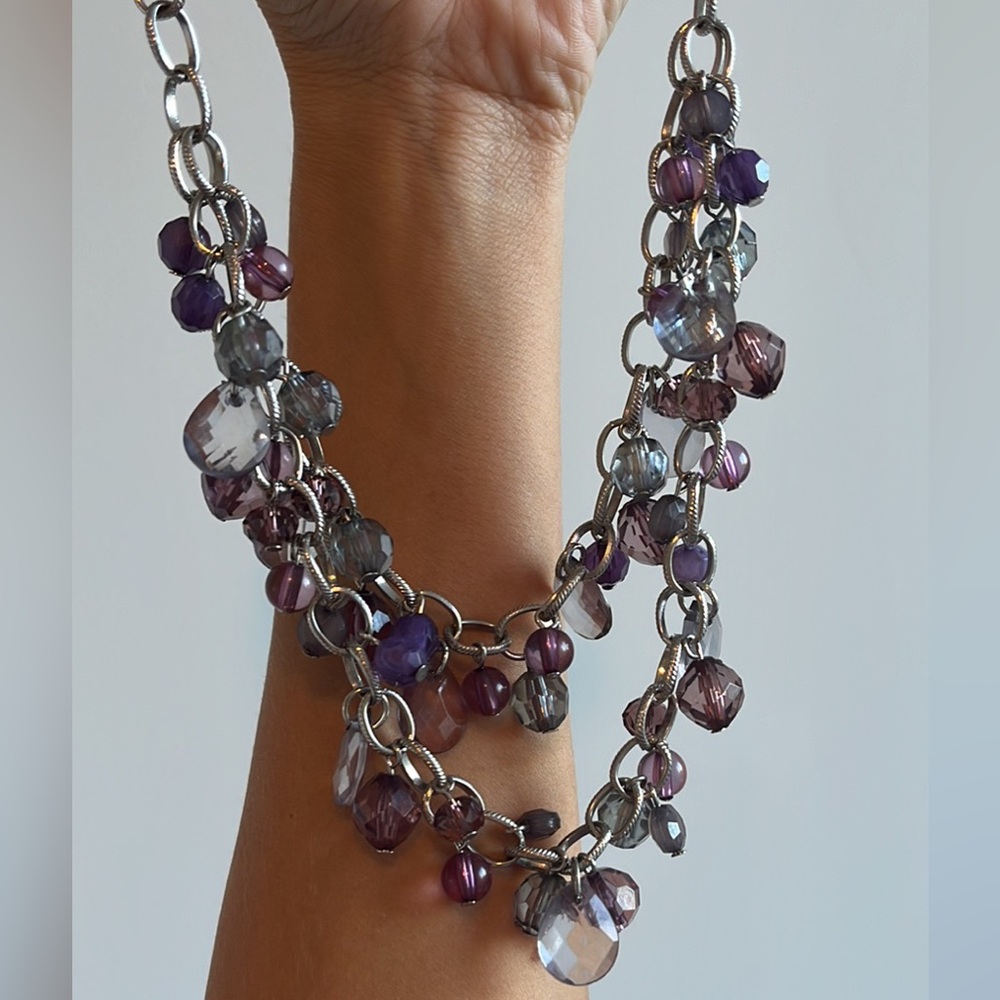 Steinmark necklace with purple crystals for elegant outfit.
